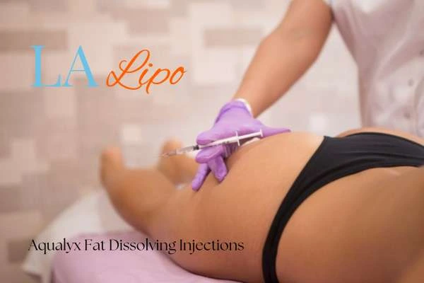 Woman having fat dissolving injections Goadby on thighs